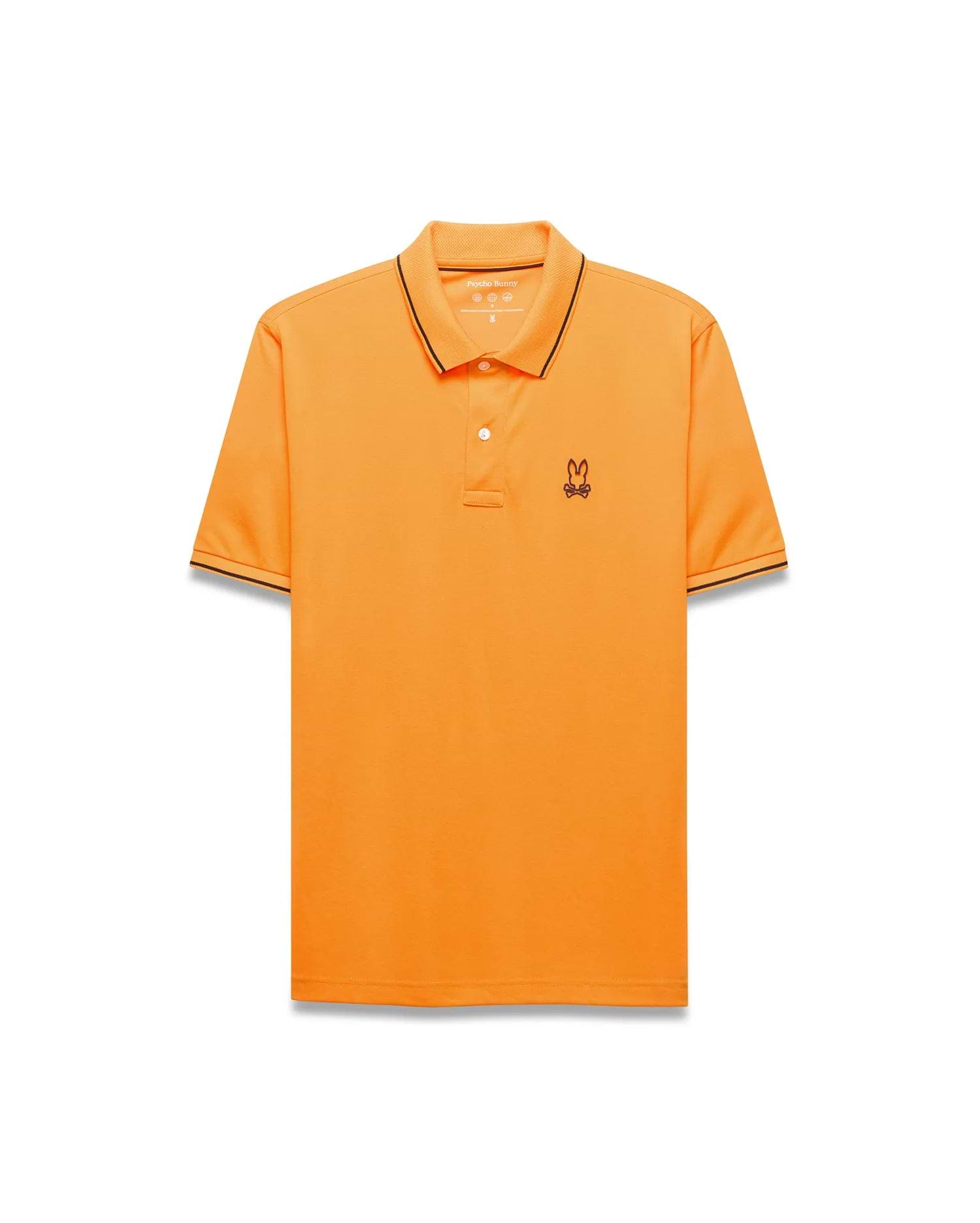 Mens Joji Performance Polo in vibrant orange, featuring a classic fit, smooth jersey fabric, black tipping on the collar and cuffs, and a small embroidered Psycho Bunny skull logo on the left chest.