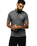 Mens Joji Performance Polo in dark heather grey, featuring a classic fit, white tipped collar and cuffs, and a small embroidered white Psycho Bunny skull logo on the left chest.