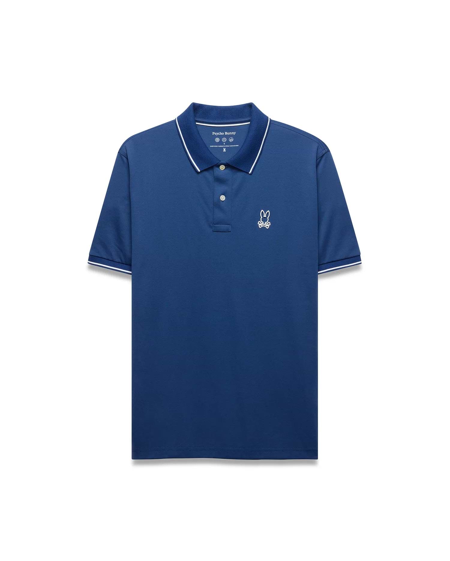 Mens Joji Performance Polo, a deep blue classic fit polo with a smooth performance fabric, features a white embroidered Psycho Bunny skull logo on the left chest and white tipping on the collar and cuffs.