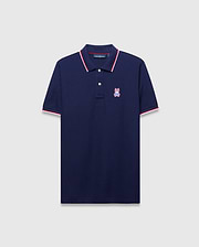 Mens John Pique Polo, a classic fit navy pique polo with red and white tipped ribbed collar and cuffs, featuring an embroidered red, white, and blue Psycho Bunny skull logo on the left chest.