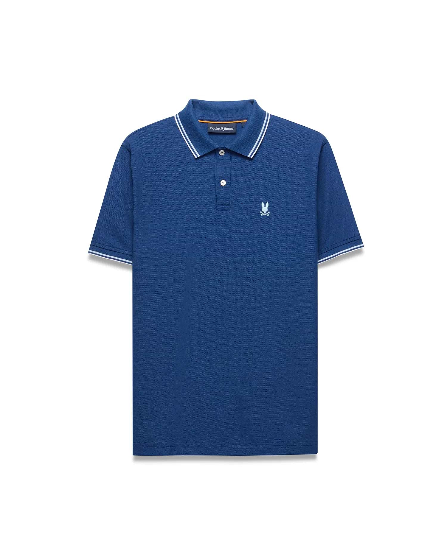 Mens Stan Pique Polo, royal blue classic fit pique knit with a two-button placket, white/light blue striped ribbed collar/cuffs, and small light blue embroidered Psycho Bunny skull logo on left chest.