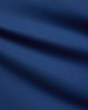 Mens Stan Pique Polo in a rich, deep blue, highlighting the classic textured pique weave, a premium and breathable fabric from Psycho Bunny menswear.