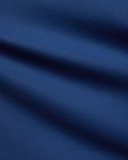Mens Stan Pique Polo in a rich, deep blue, highlighting the classic textured pique weave, a premium and breathable fabric from Psycho Bunny menswear.
