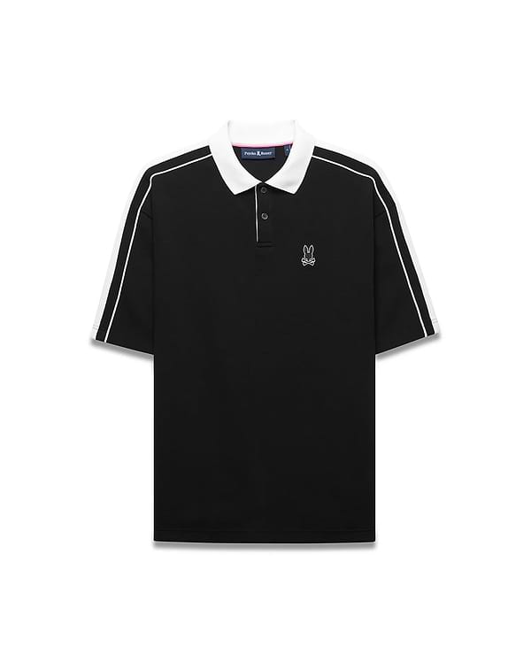 Mens Ceano Relaxed Fit Heavy Pique Polo in black with a crisp white collar, white double-stripe sleeves, and a small embroidered white Psycho Bunny skull logo on the left chest.