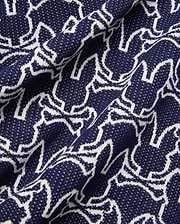Mens Sidney Oversized Knit Polo in deep navy, featuring an all-over white outline Psycho Bunny skull logo pattern on a fine, textured knit fabric, offering a relaxed fit.