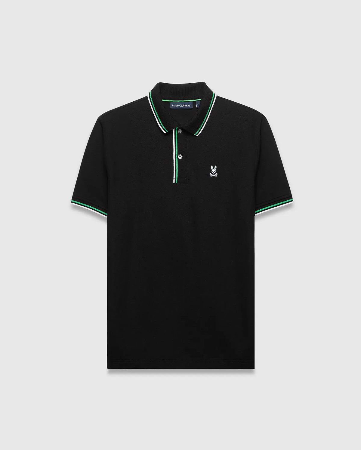 Mens Faye Pique Polo, black classic fit pique polo with green and white striped collar and cuffs, featuring a small embroidered white Psycho Bunny skull logo on the left chest.