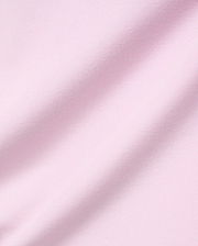 Mens Faye Pique Polo in a soft light pink, featuring a refined, classic pique knit fabric texture with gentle drapes, embodying premium Psycho Bunny style.