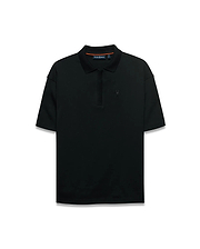 Men's Nolen Oversized Jersey Polo in black jersey fabric, featuring a ribbed collar and placket, with a small embroidered Psycho Bunny skull logo on the left chest and subtle orange accent on the inner collar. (5)