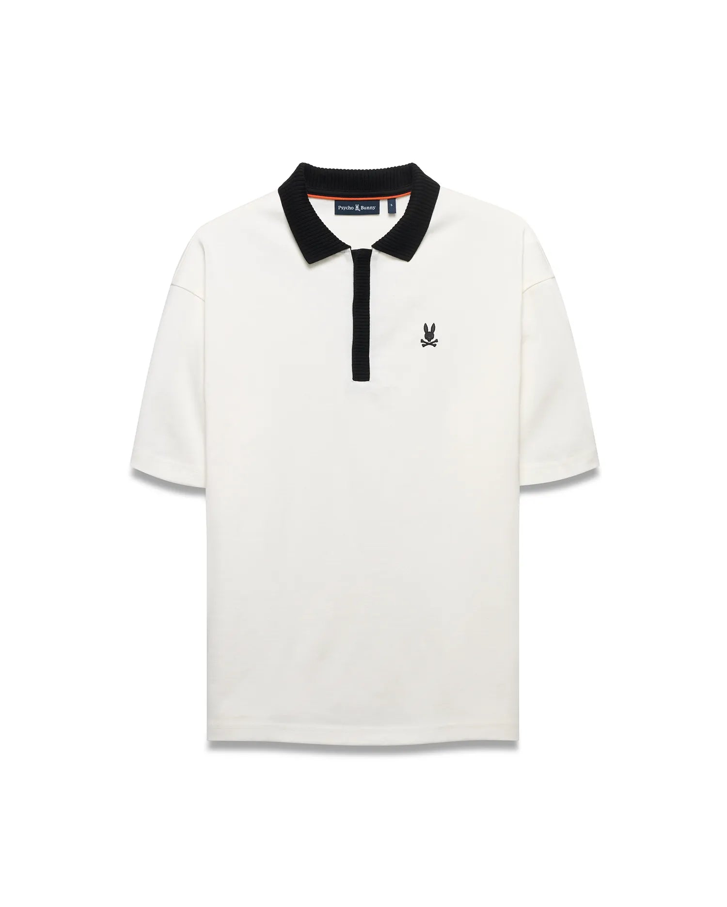 Men's Nolen Oversized Jersey Polo in cream, featuring a black ribbed collar, black placket, and a small black embroidered Psycho Bunny skull logo on the left chest. (5)