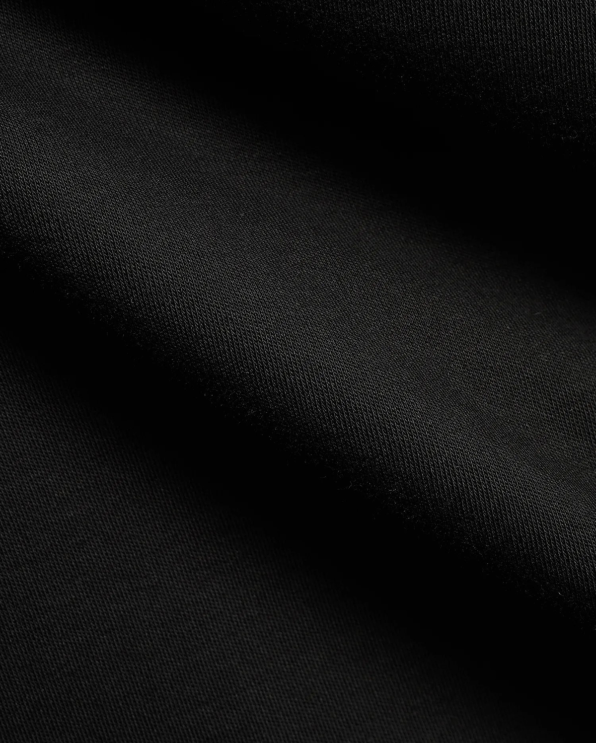 Men's Teddy Johnny Collar Polo, a classic black pique knit with a refined texture, featuring the signature embroidered Psycho Bunny skull logo on the chest for premium streetwear. (6)