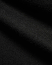 Men's Teddy Johnny Collar Polo, a classic black pique knit with a refined texture, featuring the signature embroidered Psycho Bunny skull logo on the chest for premium streetwear. (6)
