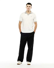 Men's Teddy Johnny Collar Polo, a classic fit off-white jersey polo with a grey patterned Johnny collar and matching sleeve cuffs, featuring a small embroidered Psycho Bunny skull logo on the left chest. (4)