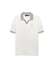 Men's Teddy Johnny Collar Polo, a classic fit white jersey knit polo with a black and white micro-houndstooth Johnny collar and sleeve cuffs, featuring a small embroidered gold Psycho Bunny skull logo on the left chest. (5)