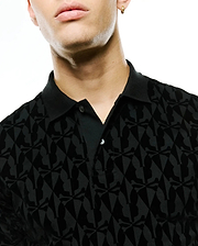 Men's Angus Flocked Polo, black classic fit pique polo featuring a tonal velvet-flocked all-over Psycho Bunny skull and crossbones pattern, complete with a two-button placket. (2)