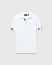 White Mens Nasser Polo, classic fit pique knit, with navy blue contrast collar trim, double striped cuffs, and an embroidered Psycho Bunny skull logo on the left chest.