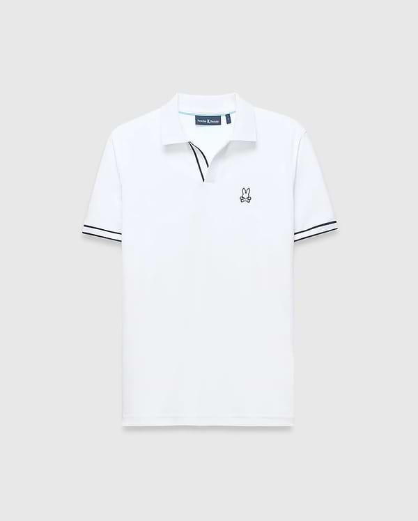 White Mens Nasser Polo, classic fit pique knit, with navy blue contrast collar trim, double striped cuffs, and an embroidered Psycho Bunny skull logo on the left chest.