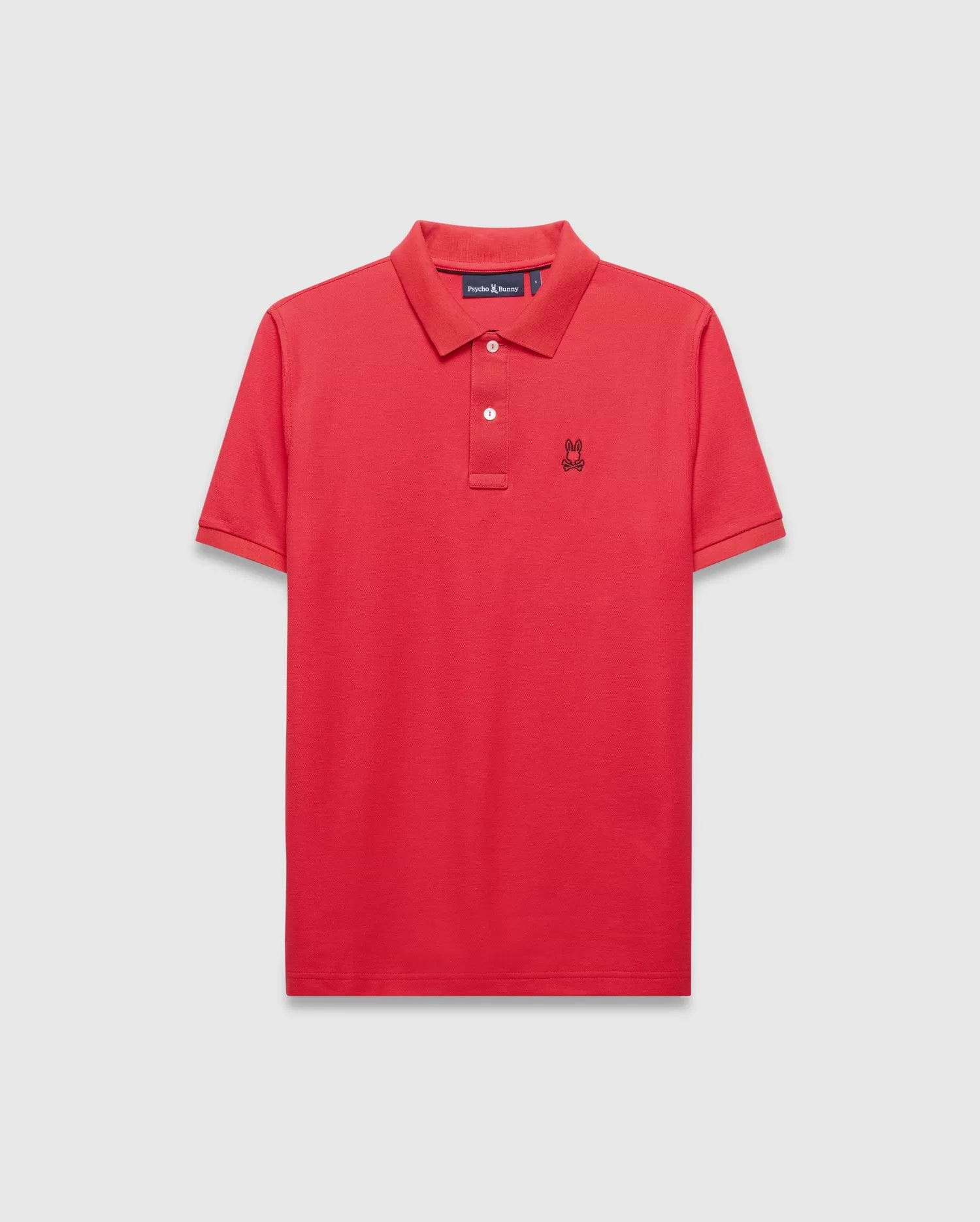 Mens Blythe Pique Polo in vibrant red, featuring a classic fit, pique texture, two-button placket with white buttons, and a small black embroidered Psycho Bunny skull logo on the left chest.