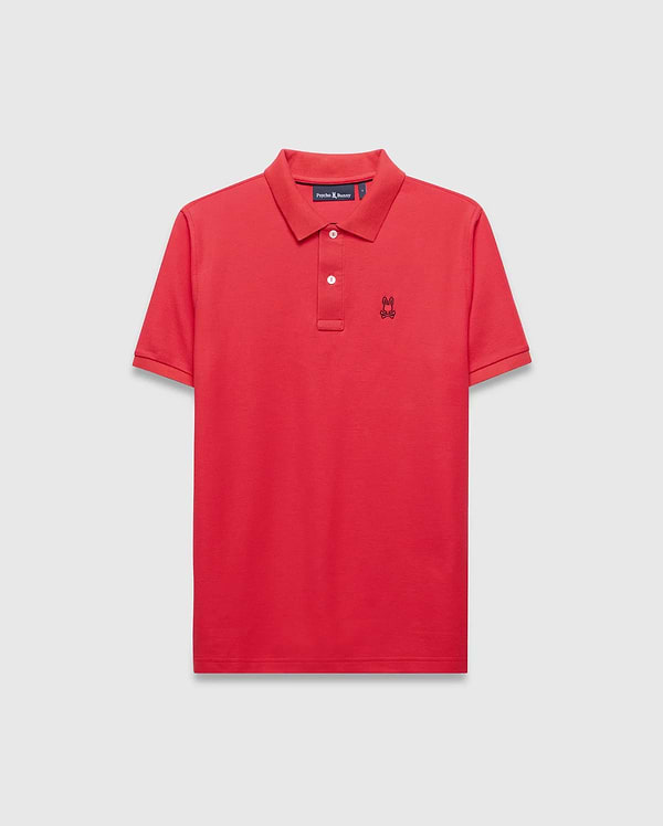 Mens Blythe Pique Polo in vibrant red, featuring a classic fit, pique texture, two-button placket with white buttons, and a small black embroidered Psycho Bunny skull logo on the left chest.