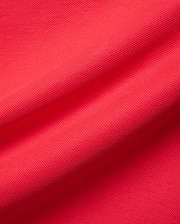 Mens Blythe Pique Polo in a rich, bold red, highlighting the refined, breathable pique fabric texture, a signature premium Psycho Bunny menswear piece.
