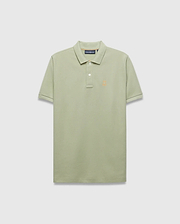 Mens Blythe Pique Polo in sage green, a classic fit polo with textured pique fabric, two-button placket, and a small embroidered orange Psycho Bunny skull logo on the left chest.