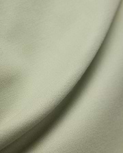 MENS BLYTHE PIQUE POLO, featuring a luxurious, breathable light sage green pique fabric with a distinctive textured weave, reflecting Psycho Bunny's premium menswear quality.