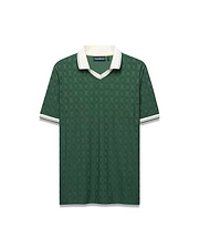 Mens Garry Jacquard Johnny Collar Polo, deep green with tonal bunny skull jacquard. Features a white Johnny collar and striped ribbed cuffs, plus a small embroidered Psycho Bunny logo on the left chest. (8)