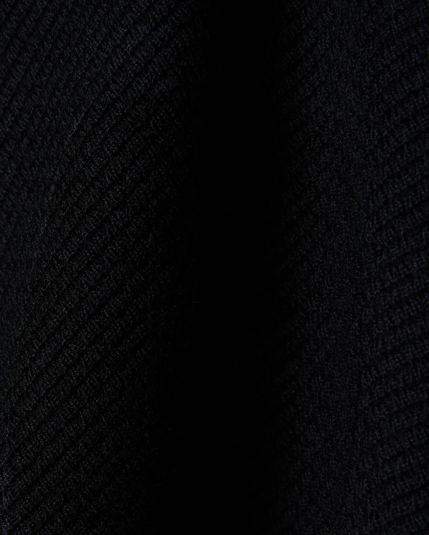 Black Mens Leroy Long Sleeve Knit Polo by Psycho Bunny, featuring a premium, subtly textured knit fabric with a refined, dense weave, perfect for sophisticated streetwear.