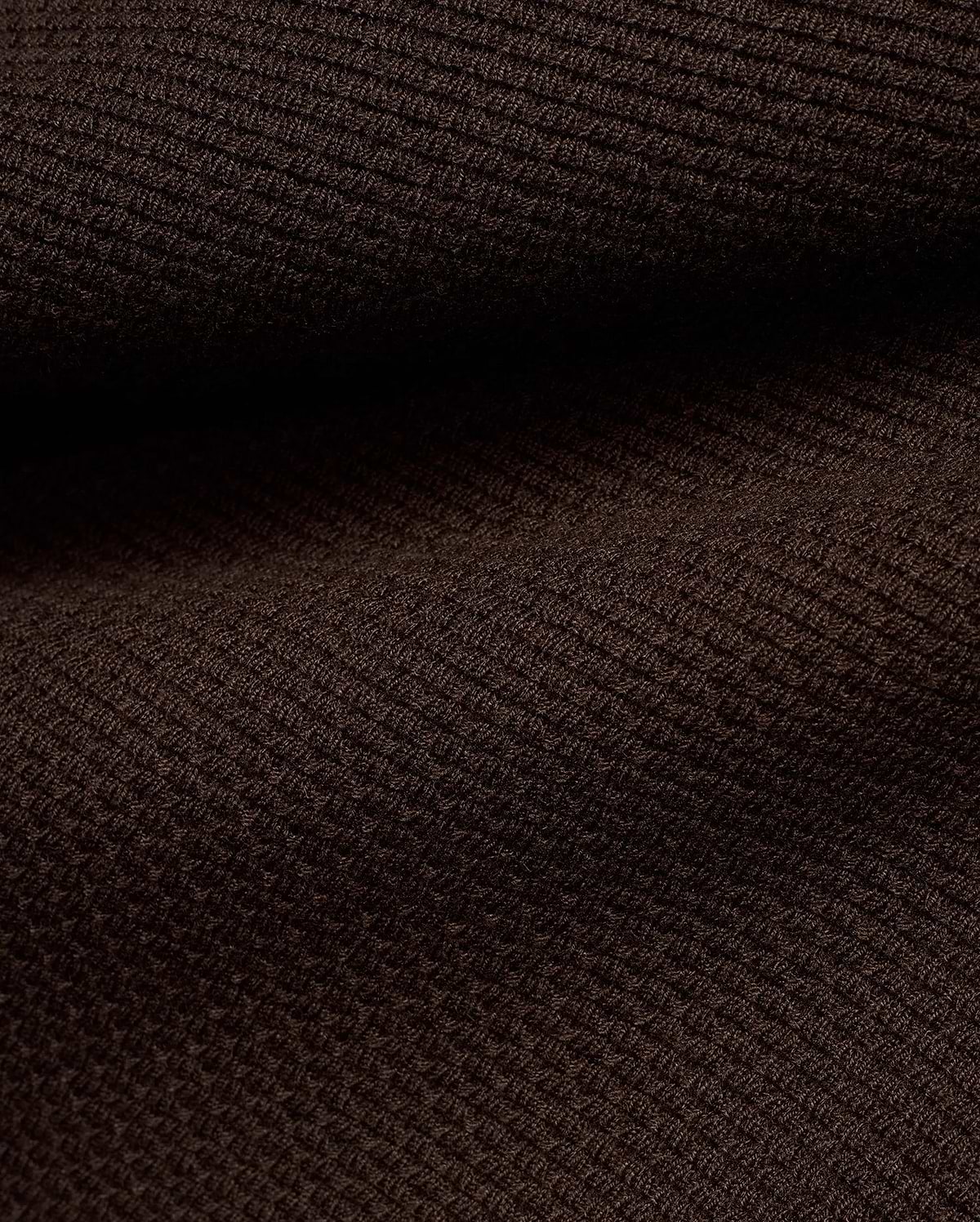 Men's Leroy Longsleeve Knit Polo in rich dark brown, featuring a premium fine knit fabric with a subtle, refined diagonal ribbed texture, characteristic of Psycho Bunny's quality. (6)