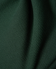 Mens Leroy Long Sleeve Knit Polo in dark green, featuring a prominent ribbed knit texture with subtle fabric folds. (6)