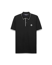 Mens Robin Pique Polo, black classic fit with cream piping on the collar and cuffs, featuring a textured pique fabric and an embroidered Psycho Bunny skull logo on the left chest.