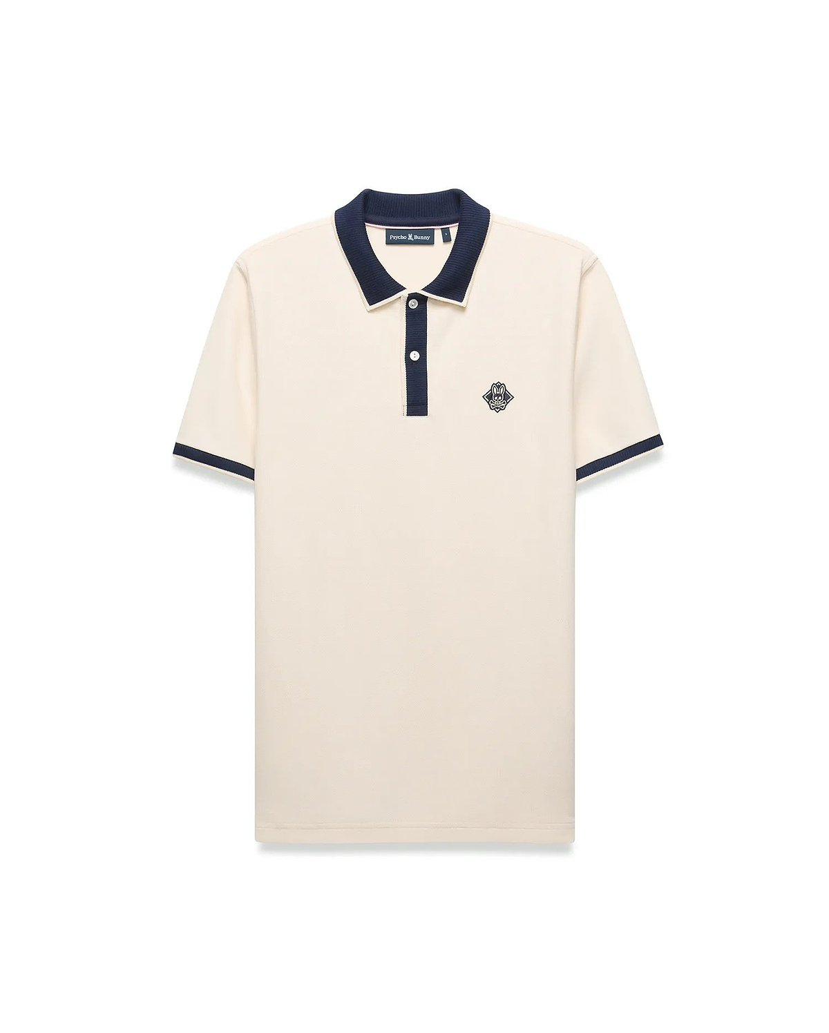 Mens Robin Pique Polo, a classic fit cream pique polo with navy blue ribbed collar, two-button placket, cuffs, and an embroidered Psycho Bunny skull logo on the left chest.
