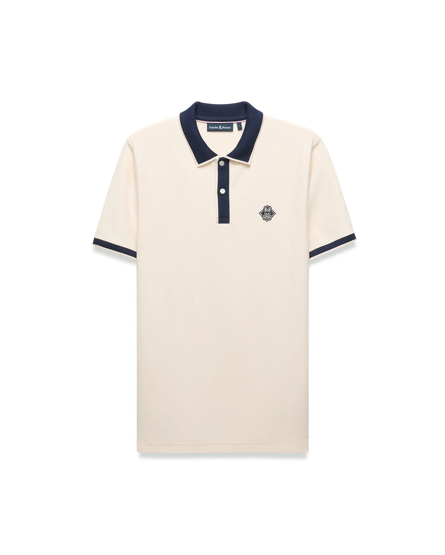 Mens Robin Pique Polo, a classic fit cream pique polo with navy blue ribbed collar, two-button placket, cuffs, and an embroidered Psycho Bunny skull logo on the left chest.