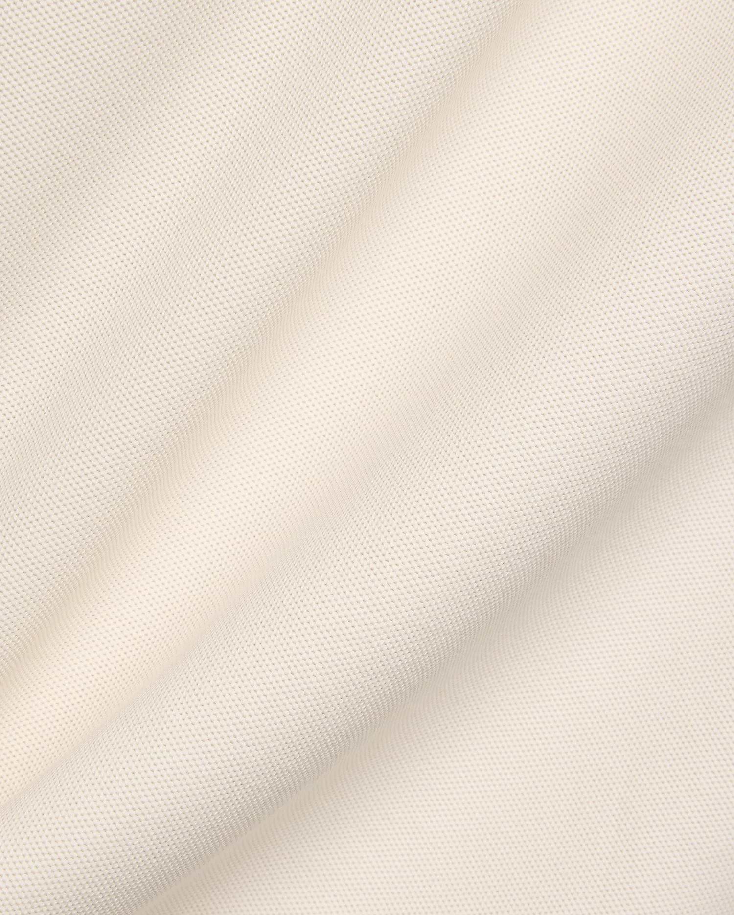 Mens Robin Pique Polo in cream, a premium Psycho Bunny garment crafted from textured pique fabric, typically featuring the iconic embroidered bunny skull logo on the chest.