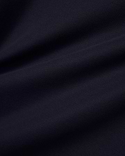 Men's Grover Pique Longsleeve Polo in a deep, luxurious navy blue, showcasing the premium, breathable pique fabric texture with subtle, elegant drapes, perfect for refined streetwear. (6)