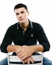 Men's Grover Pique Longsleeve Polo, deep green classic fit pique with a two-button placket, grey-lined striped collar, ribbed cuffs, and a white embroidered Psycho Bunny skull logo on the left chest. (3)