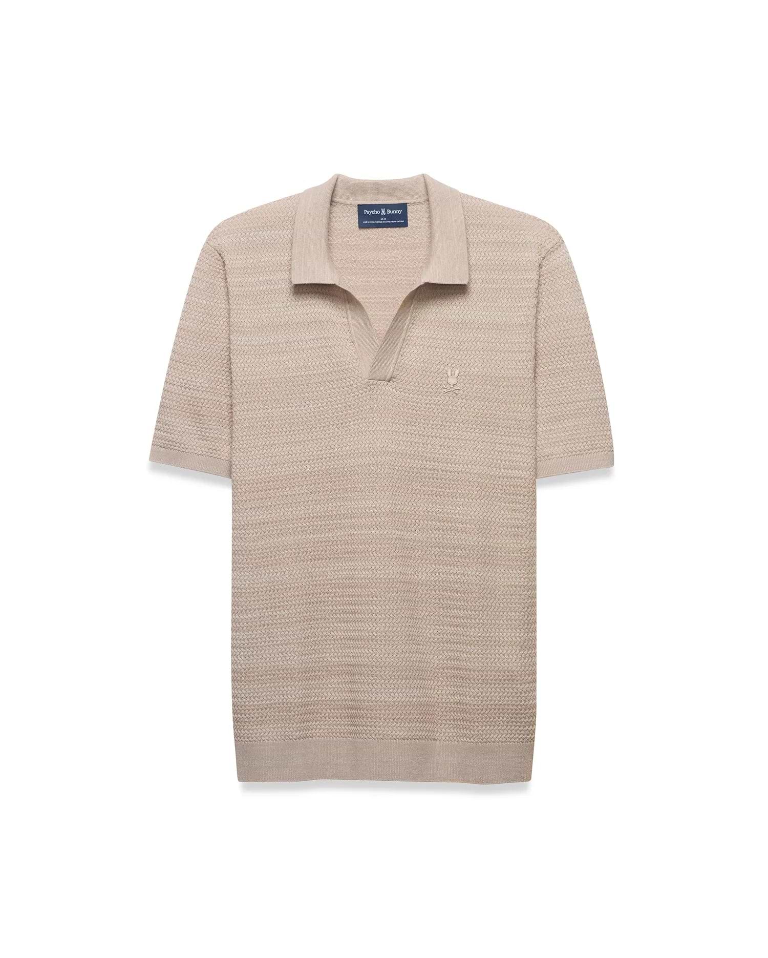 MENS DEVON BRAIDED STITCH KNIT POLO in beige, featuring a classic fit, textured braided knit fabric, spread collar, V-neck placket, and a small, embroidered tone-on-tone Psycho Bunny skull logo on the left chest.