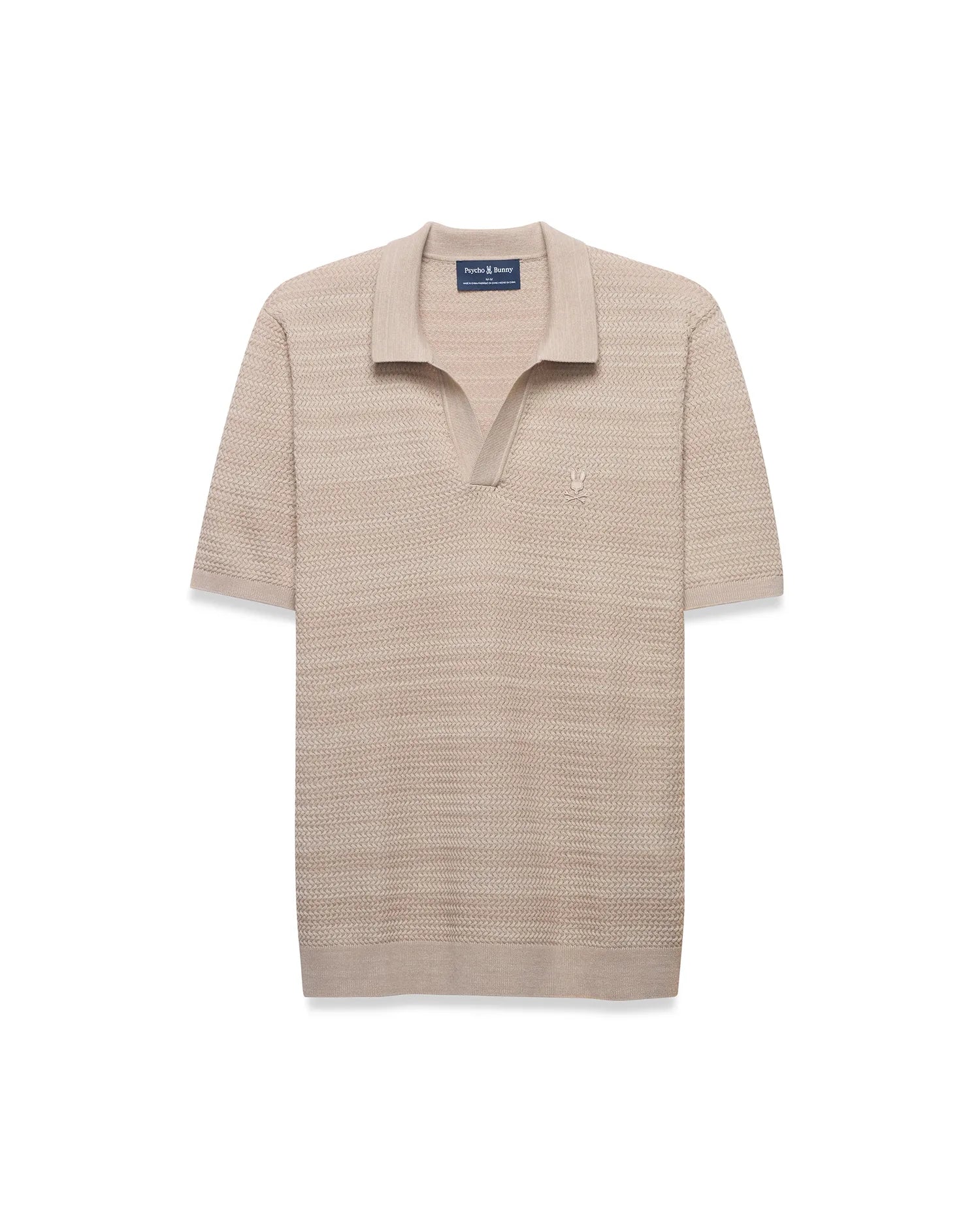 MENS DEVON BRAIDED STITCH KNIT POLO in beige, featuring a classic fit, textured braided knit fabric, spread collar, V-neck placket, and a small, embroidered tone-on-tone Psycho Bunny skull logo on the left chest.