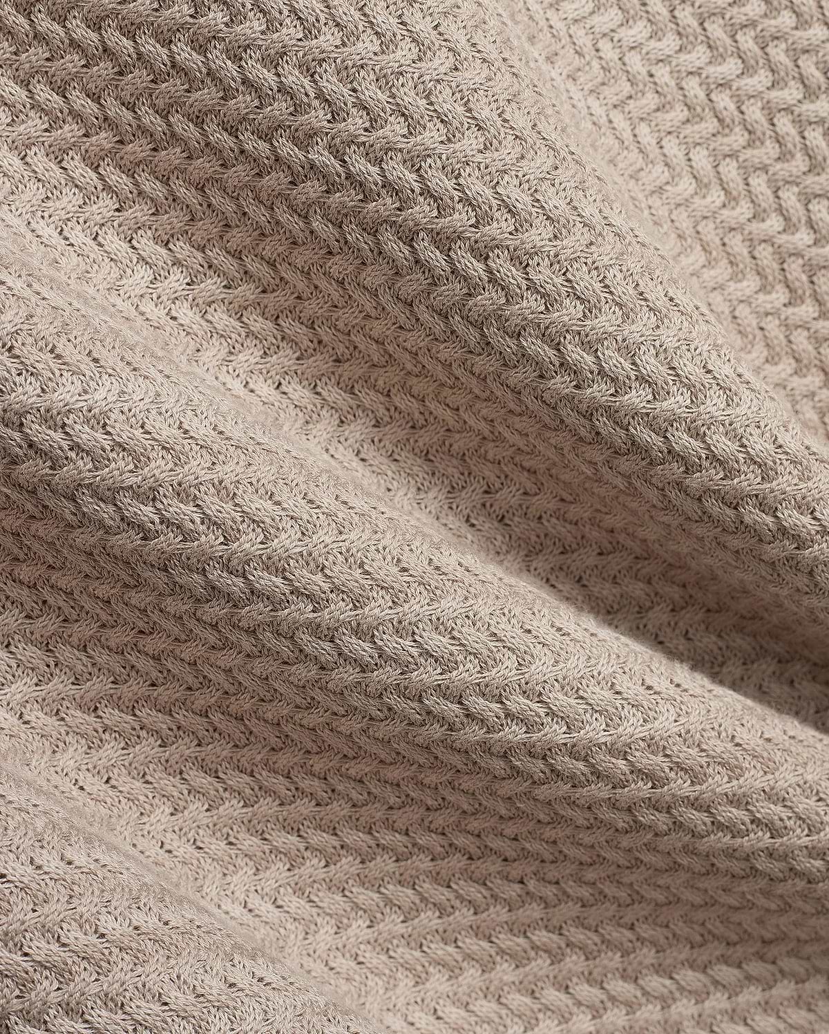 Mens Devon Braided Stitch Knit Polo, a premium beige knit polo featuring a refined, intricate braided stitch pattern, showcasing luxurious texture and sophisticated style.