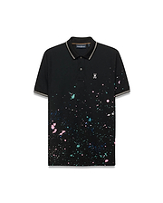 Mens Malcolm Splatter Polo, a classic fit black pique polo with vibrant multi-color splatter print, striped collar/cuff tipping, and a small white embroidered Psycho Bunny skull logo on the left chest. (5)