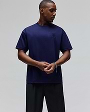 Mens Oscar Oversized Tee in deep navy blue, featuring a small, tonal embroidered Psycho Bunny skull logo on the left chest, crafted from smooth jersey fabric for a relaxed fit.