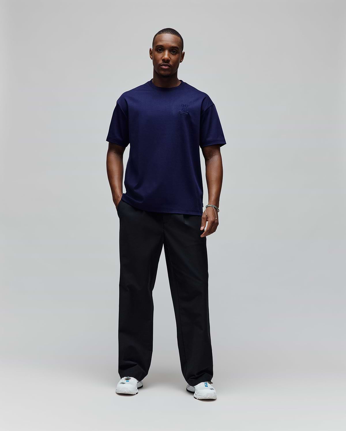 Mens Oscar Oversized Tee, a navy blue oversized t-shirt in smooth jersey knit, featuring a tonal embroidered Psycho Bunny skull logo on the left chest.
