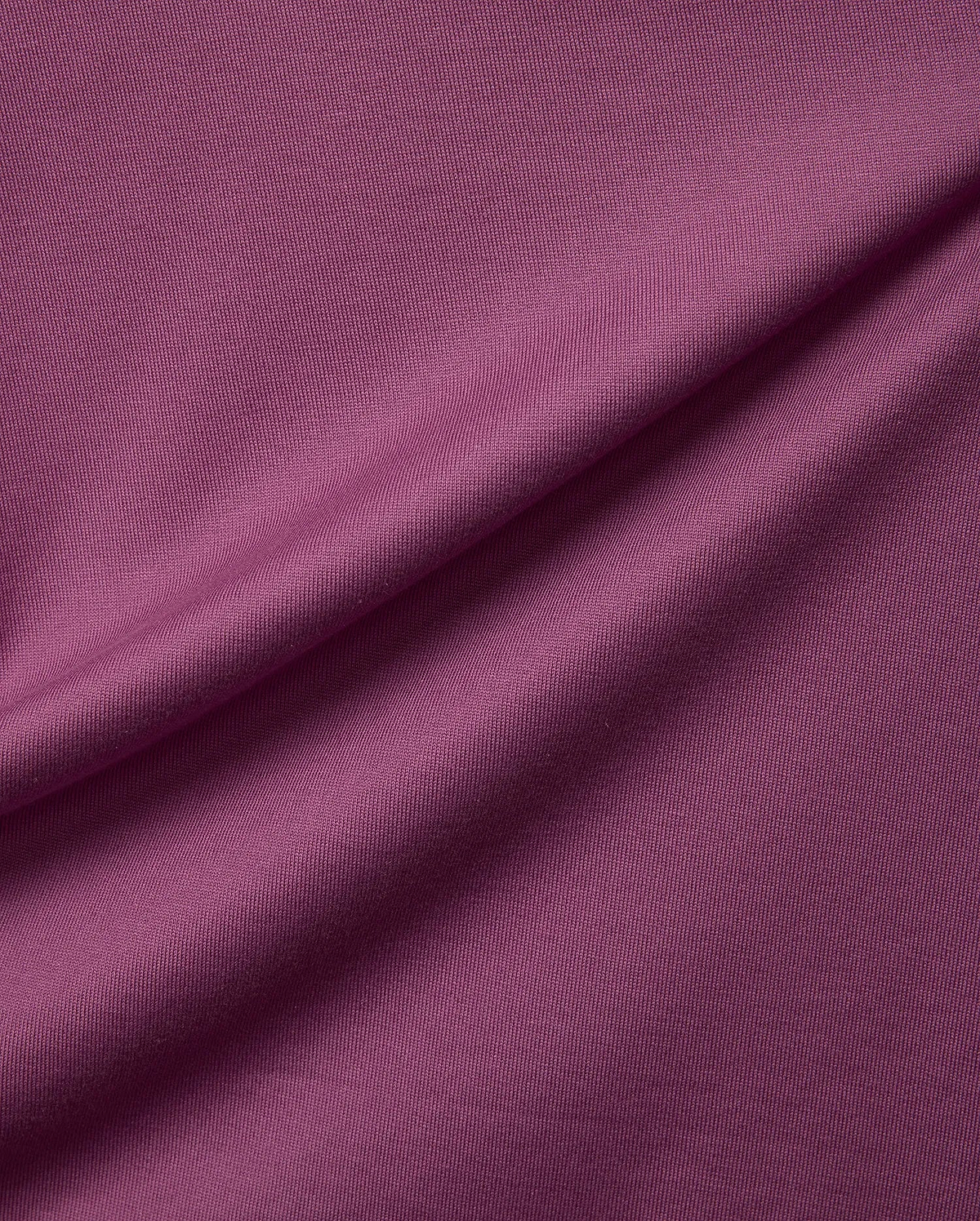 Psycho Bunny Mens Oscar Relaxed Fit Tee in a rich plum jersey knit fabric, showcasing a soft, finely textured surface with gentle drapes.