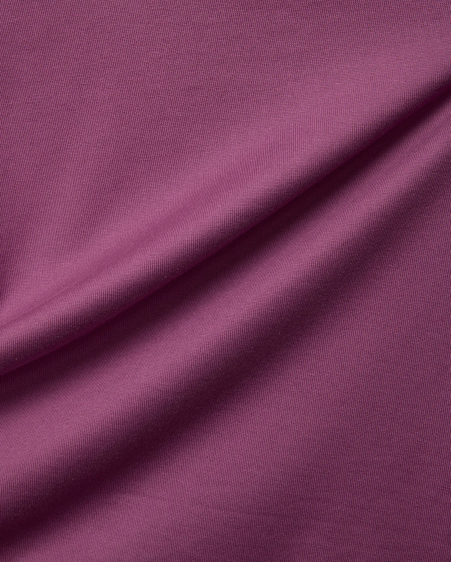Psycho Bunny Mens Oscar Relaxed Fit Tee in a rich plum jersey knit fabric, showcasing a soft, finely textured surface with gentle drapes.