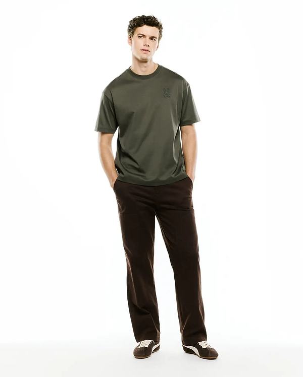 Mens Oscar Relaxed Fit Tee in dark olive green jersey knit, featuring a small, tone-on-tone embroidered Psycho Bunny skull logo on the left chest.