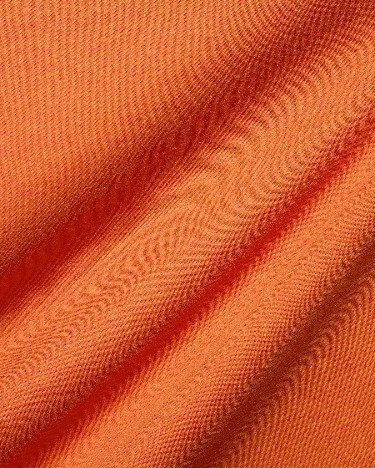 Men's Oscar Oversized Tee, a premium streetwear staple in vibrant heathered orange, crafted from soft jersey knit fabric with natural folds, offering a comfortable, relaxed fit. (6)