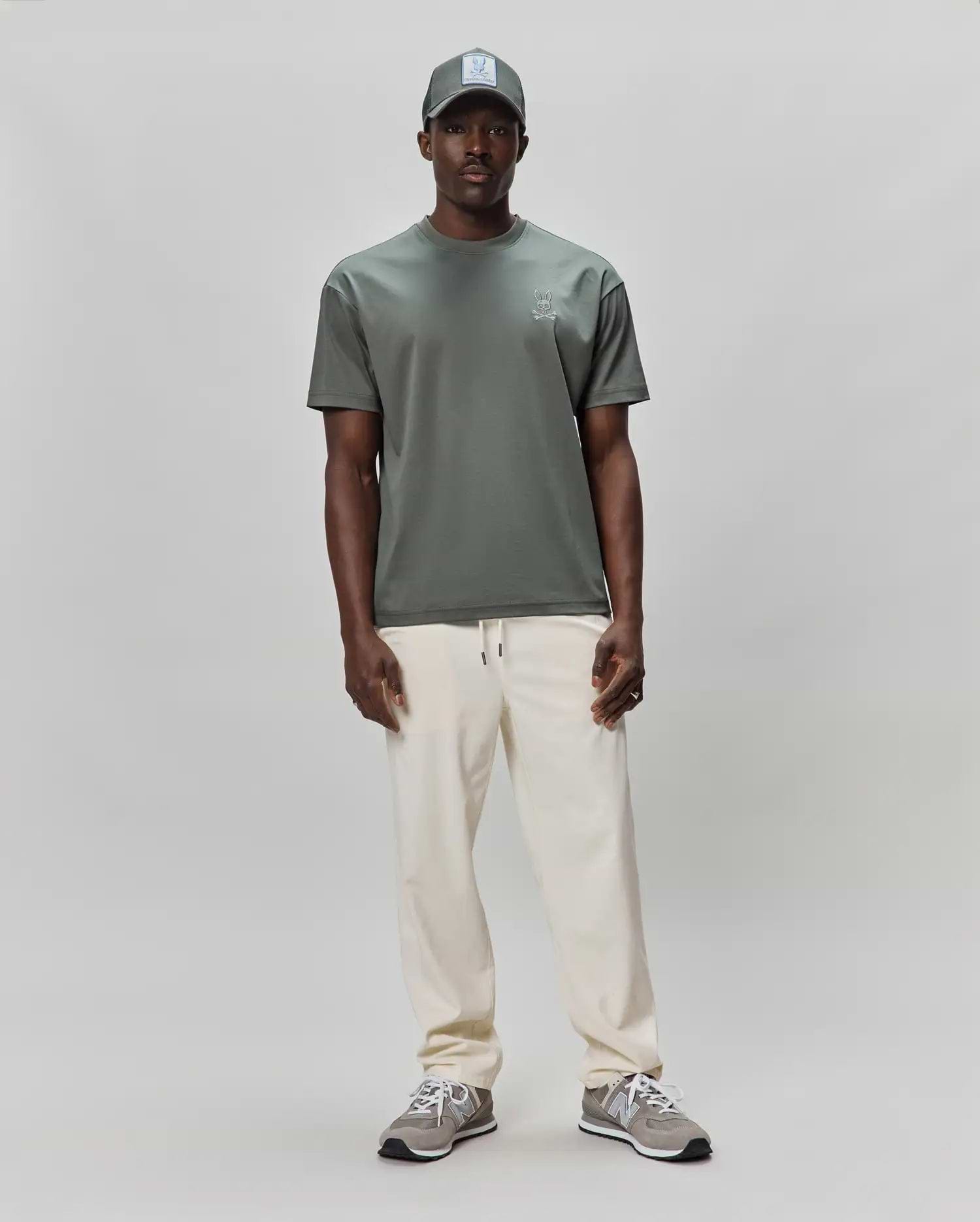 Mens Oscar Oversized Tee in dark sage green, featuring a smooth jersey knit fabric and a small, embroidered light grey Psycho Bunny skull logo on the left chest for a refined streetwear look. (3)