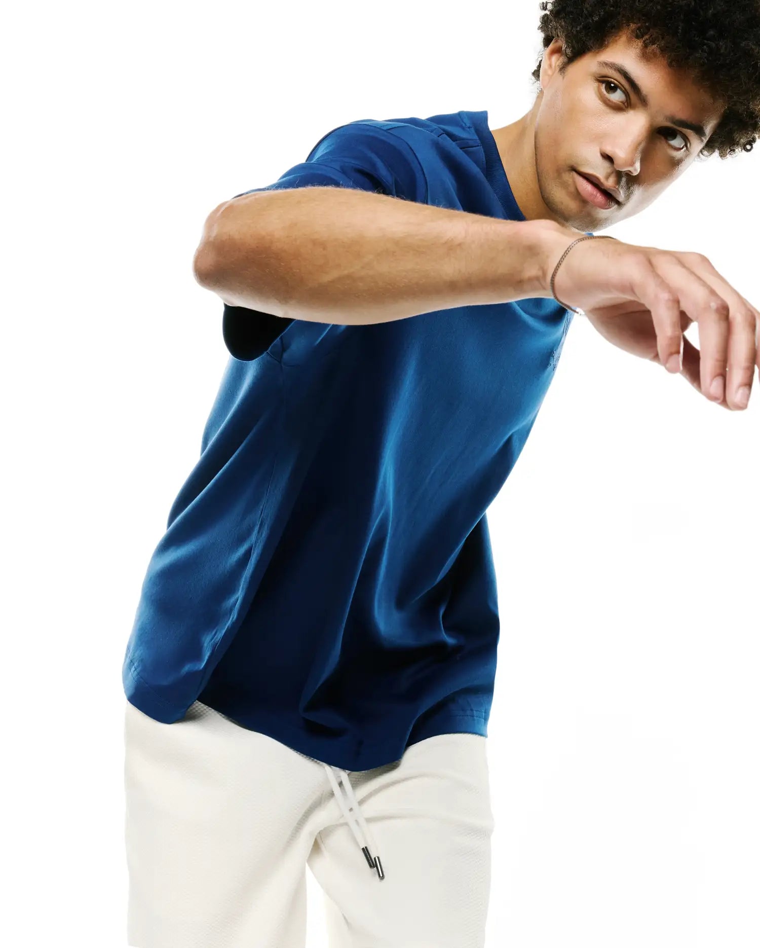 Mens Oscar Relaxed Fit Tee in deep blue, featuring a smooth jersey fabric and a small, embroidered Psycho Bunny skull logo on the left chest, designed for a relaxed fit.