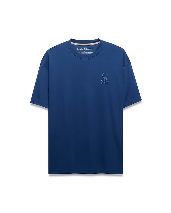 Mens Oscar Relaxed Fit Tee, a deep blue smooth jersey t-shirt featuring a small, lighter blue embroidered iconic Psycho Bunny skull logo on the left chest.