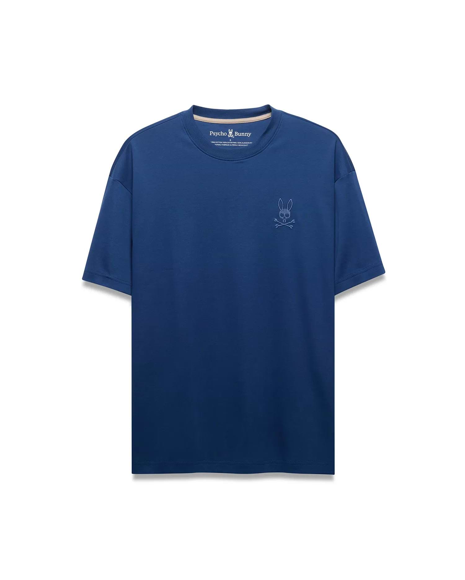 Mens Oscar Relaxed Fit Tee, a deep blue smooth jersey t-shirt featuring a small, lighter blue embroidered iconic Psycho Bunny skull logo on the left chest.