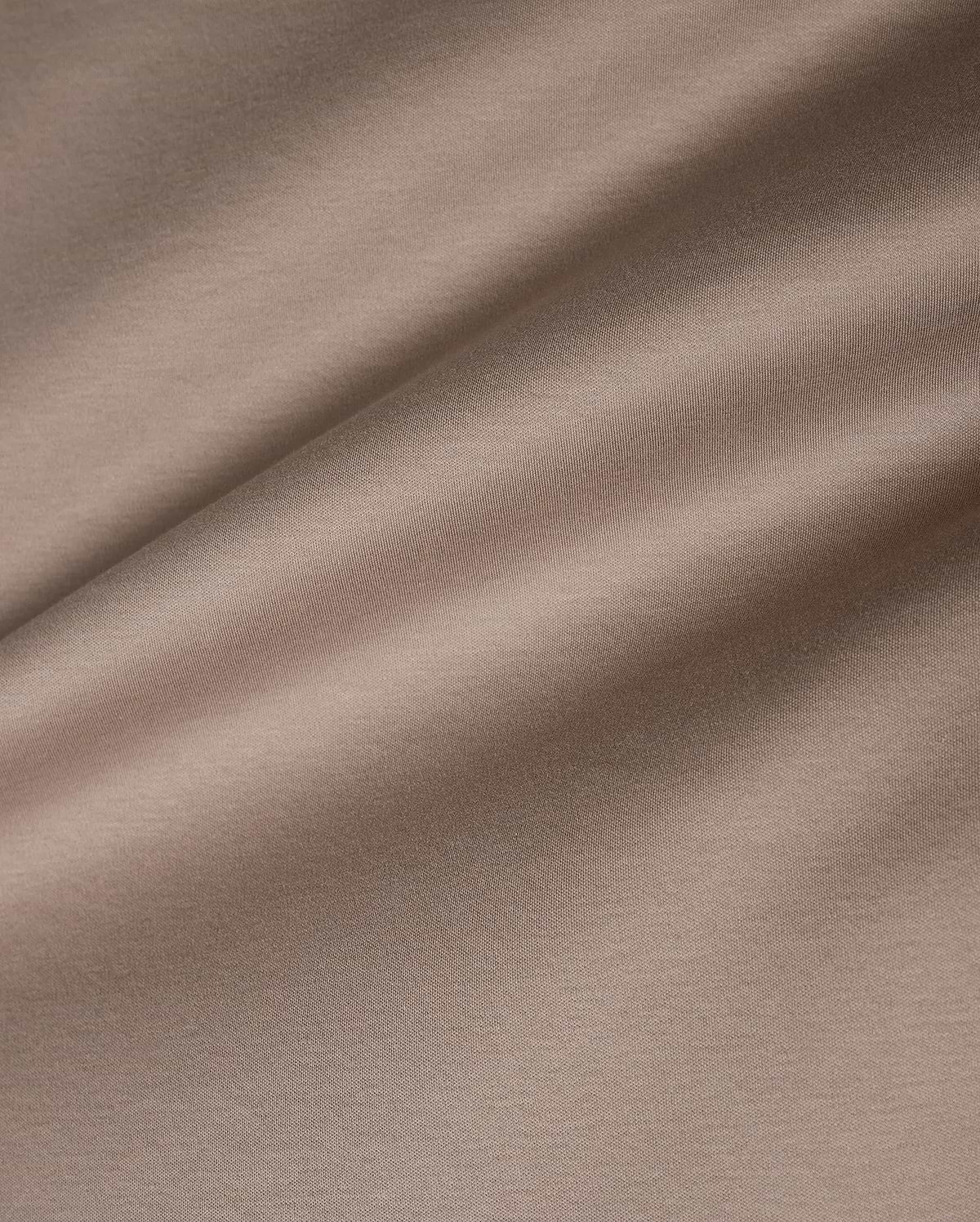 Men's Oscar Oversized Tee in premium, soft taupe jersey knit fabric, featuring a smooth texture with subtle horizontal ribbing and a relaxed drape, ideal for refined streetwear. (6)